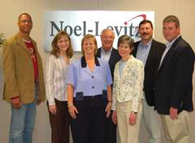 Cornellians at Noel-Levitz, left to right: Wes Butterfield ’91, executive consultant; Beth Richter ’83 and Julie Bryant ’88, both associate vice presidents for retention solutions; Cornell trustee and former dean of admission (1982–1992) Peter Bryant, senior vice president; Janene Panfil ’89, senior vice president for retention solutions; Craig Engel ’87, senior vice president for consulting services; and Kevin Crockett, president and CEO, who worked in Cornell admission from 1988–95 and was dean from 1992–95. Not pictured: Cornell Alumni Board member Mary Jo Huebner ’88, executive consultant..