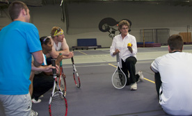 Professor Ellen Whale talks to her Methods for Individual Sports class, where students learn how to teach others to play sports. (Photo by Jamie Kelly)