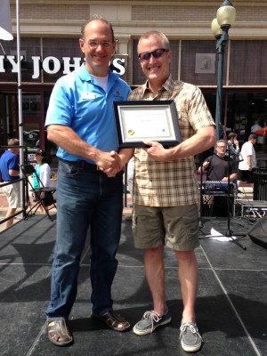 Ron Corbett ’83 presented Barry Boyer ’84 with the 2013 Five Seasons Citizenship Award on June 1.