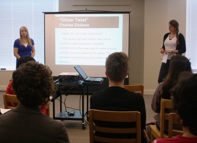 Seniors Léonie de Jonge and Amanda Engel practice their proposal for an audience of Cornellians.