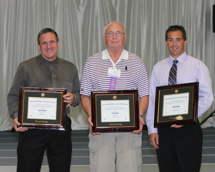 Matt Trimble ’85 (son of Ocie Trimble), Phil Gibbs ’66, and Brent Sands ’93 accept awards at the Rams Hall of Fame induction ceremony