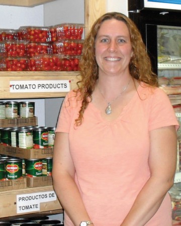 After receiving a master's degree in social work, Tina Effner DuBois '99 became the executive director of the North Liberty Community Pantry, now recognized as a model for others around the nation and the world (Photo by Tina Effner DuBois '98)