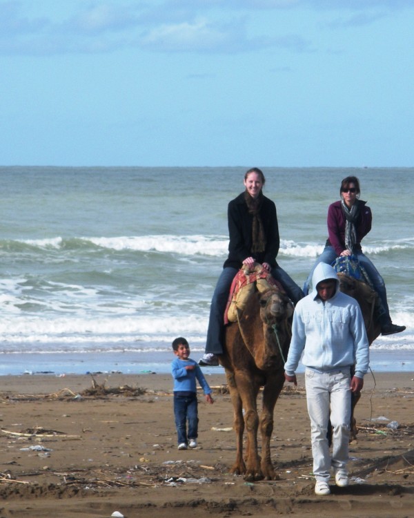 A small boy singing in Arabic accompanied students on a camel ride in Morocco