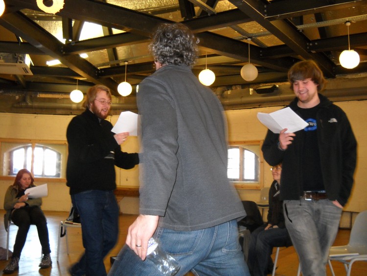 A Shakespearean actor leads a workshop at the reconstructed Globe Theatre. 