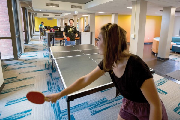 Students play ping-pong and billiards in Pauley-Rorem Hall. Photo by Robyn Schwab Aaron ’07