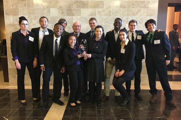 Cornell’s Enactus team, left to right: April Richards, Hwi Ram Jeong, Abubakar Shehu, Nigel Ticknor, Anh Pham, Enactus advisor Tom Simon, Ryan Anderson, Robin Bridgman, Husani Newbold, Zara Anderson, Gabe Flippo, and Salem Osaki. 