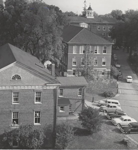 At one time cars were allowed on the campus center. Today the Hilltop walkway is reserved for pedestrians. (Photo from the Cornell Archives)