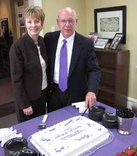 Retired Alumni Director Ruth Keefe Miller '66 celebrates with her husband, Steve Miller '65, as the college honors him with a retirement reception. (Photo by Dee Ann Rexroat '82)