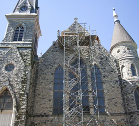 King Chapel as it looked in the summer of 2010, with scaffolding all around and workers replacing tiles on the roof. (Photo by Jamie Kelly)