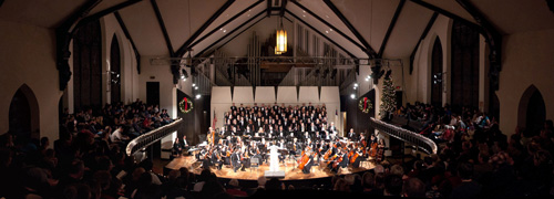 The combined concert choir and orchestra fill King Chapel's stage to perform John Rutter's Magnificat during the 2010 holiday concert. 