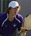 Sophomore Justin Bradfield stands at the net during Cornell's match against University of Dubuque. (Photo by Kerry Kahl)