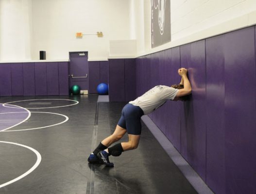 A Cornell wrestler quiety prepares for his match in the Meredith Wrestling Complex. 