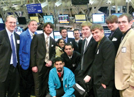 A class photo of students with Conrad (far left) on the trading floor of the CBOE. Students also visited with administrators at the Bank of America and Advocate Health Care during their off-campus experience. Students left to right are: senior Paul Tompkins, Junior Dane Korthauer, Nate Benzschawel '08, senior Zari Zahra, senior Atanas Siakolov, junior Andre DeSouza, unaffiliated individual, junior Frank Dixson, senior Danial Engstrom, junior Yuri Mitchell, and senior Ryan Caulfield. 