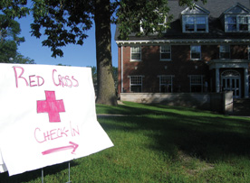 A total of 677 Red Cross volunteers from s far as Alaska lived in Olin and Merner halls in June and July. Signs guided volunteers to check-in stations in the residence halls. (Photo by Jennifer Boettger) 