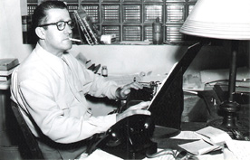 Verne Jay '25 works at his typewriter at WLW Radio-TV in Cincinnati. 