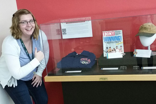 Amy Harrison ’18, the Stimson Fellow in Museum Studies, with a small exhibit she curated at the African American Museum of Iowa. 