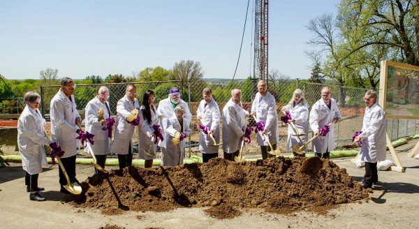 Participants shoveled dirt to mark the commencement of construction for the Russell Science Center.