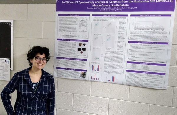 Photo of Samantha Nadel with research poster