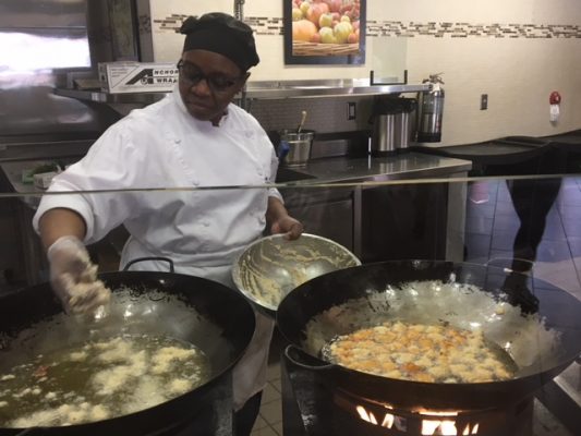 Austina Smith frying black-eyed peas.