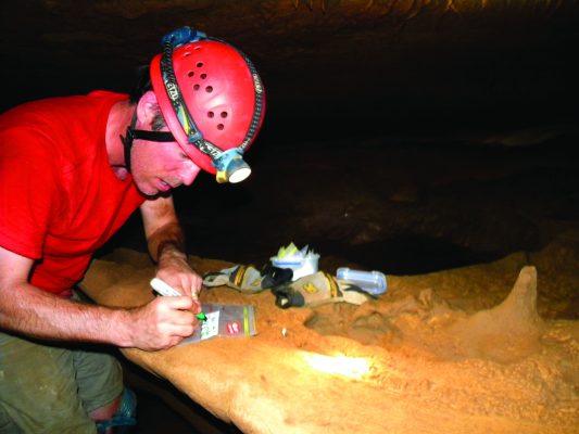 Rhawn Denniston working in an Australian cave.