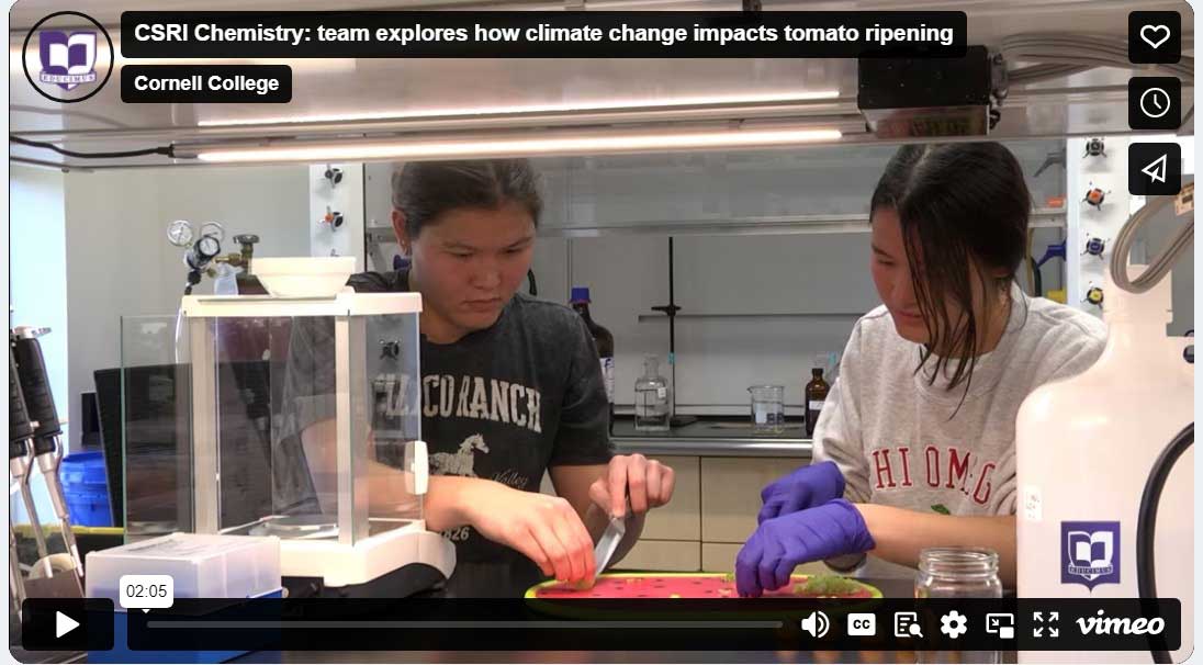 Images of professor and two students discussing research in a lab with a Vimeo play button on the image.