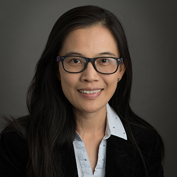 Associate Professor of Finance Huan Cai 
