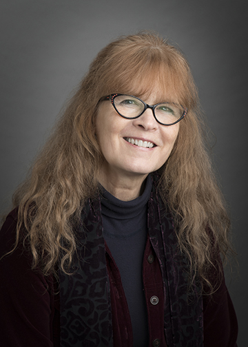 headshot photo of Sandra Dyas