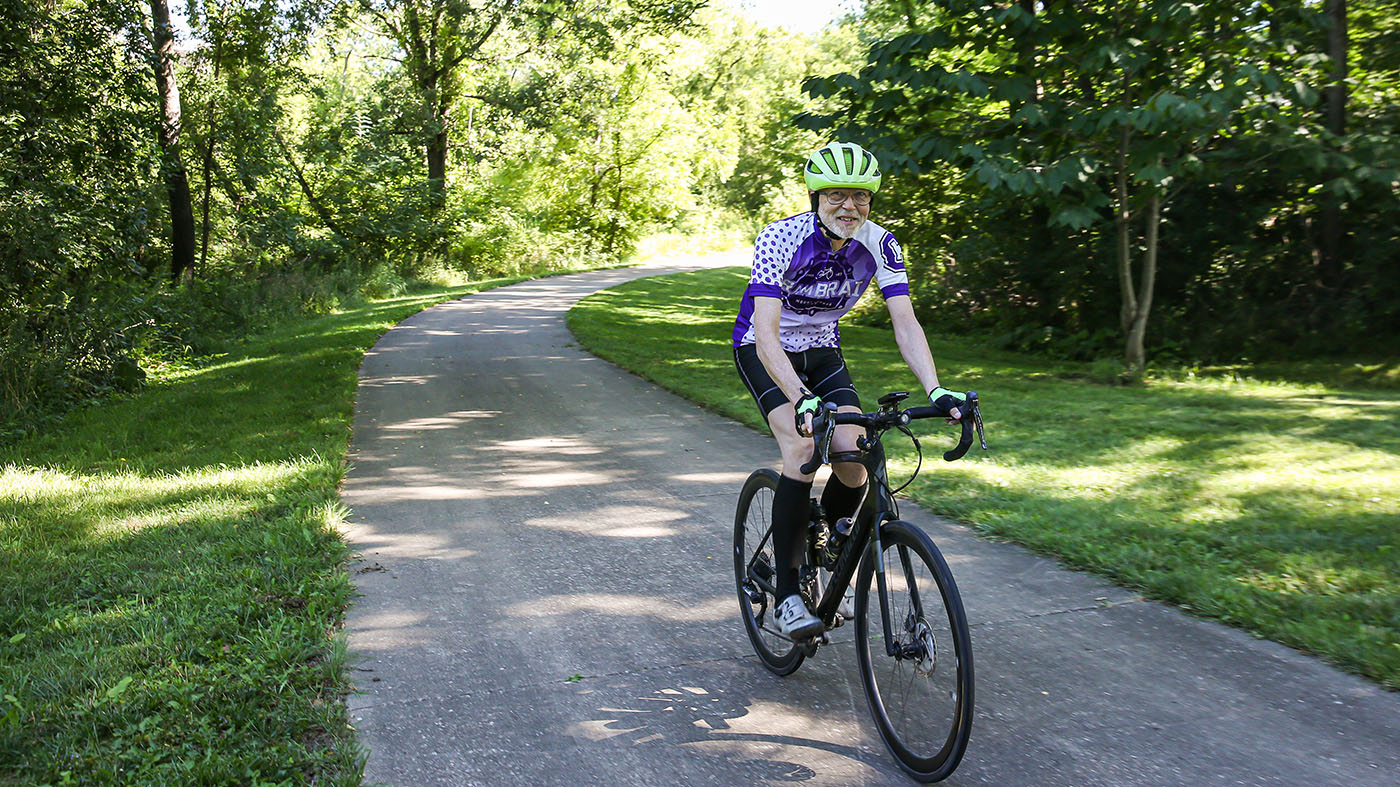 Professor Emeritus Craig Allin riding his bike