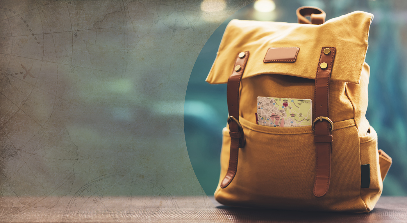A travel backpack and a global map overlay
