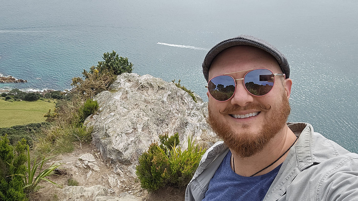 Justin Clinton-Gohdes ’06 visiting Mount Maunganui, New Zealand, on the Pacific Ocean.