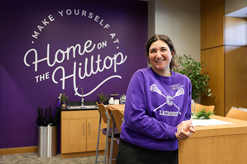 Lizzy Ott in the Welcome Center at Cornell College.
