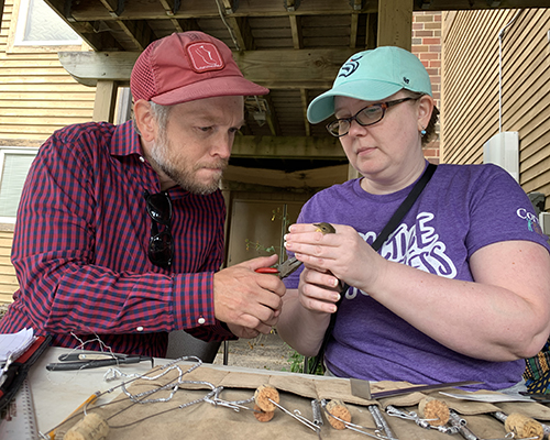 Amy Gullen and Josh Otten banding a bird at Indian Creek Nature Center for my Vertebrate Zoology class.