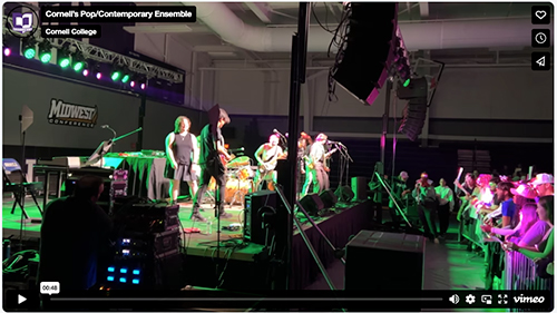Students playing contemporary music on a stage