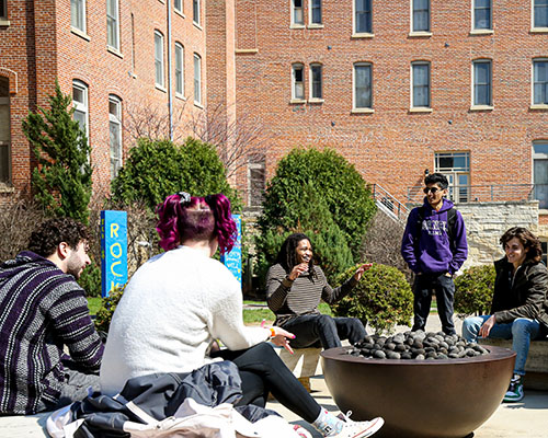 Cornell students spending time together outside of Thomas Commons