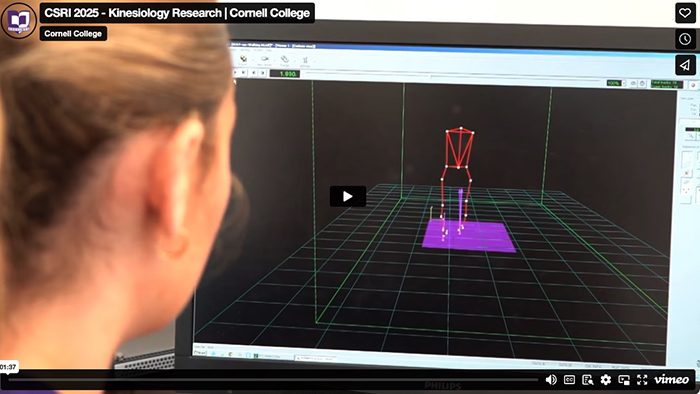 Video screen with a play button and a background picture of a digital person on a computer