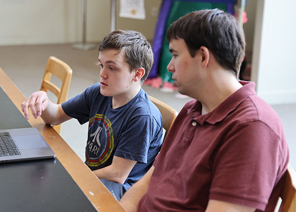 Joe Wald '27 and Professor Tyler George discuss the data they've been collecting.