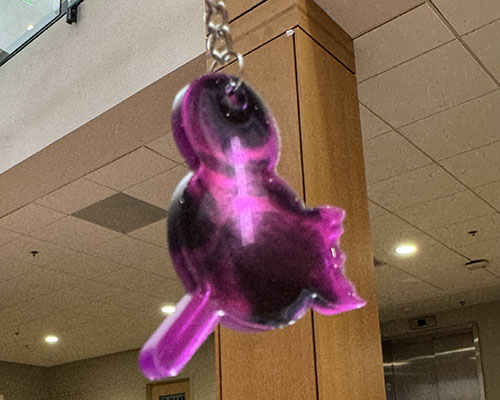 An epoxy keychain made by Alecks Brozo '27