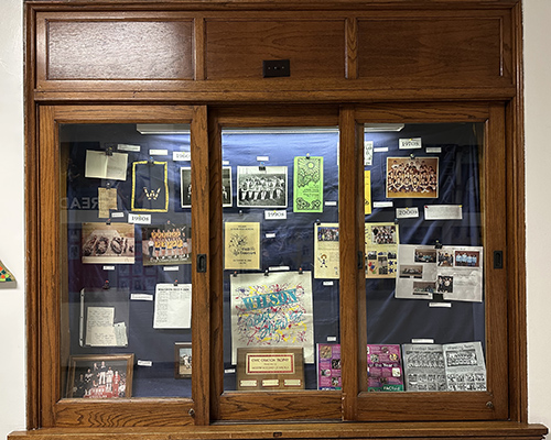 A full display case at the Wilson Middle School Centennial display