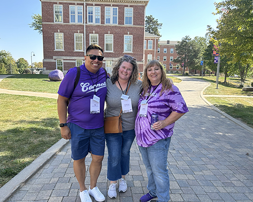 Photo of three friends on the Cornell College campus.