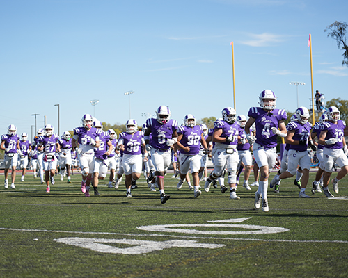 The Rams run onto the field for Homecoming 2025.