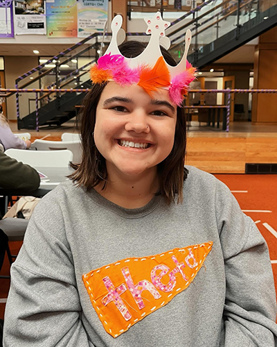 A student shows off their finished DIY Crown.
