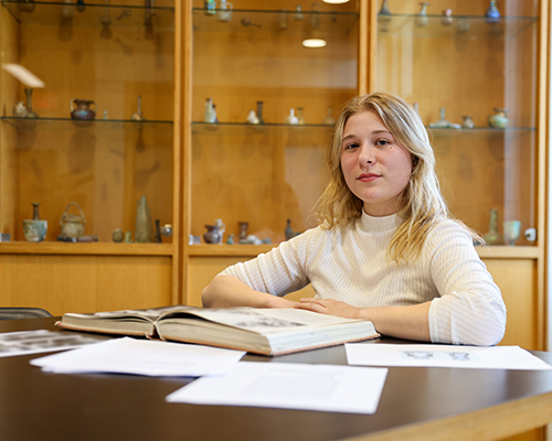 Natalie Zenk with her research materials