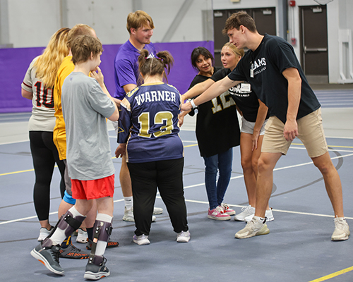 Students gather for a high-five.
