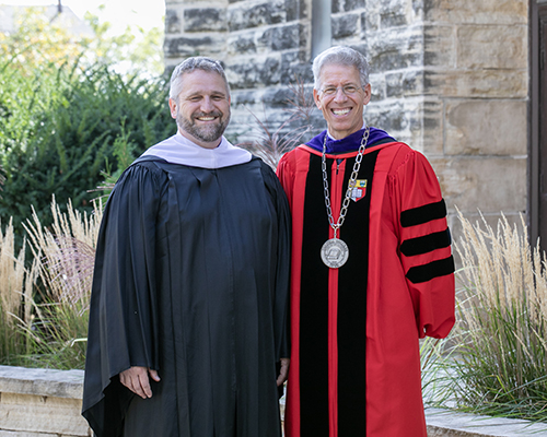 Rob Poggenklass '03 (left) and President Brand.