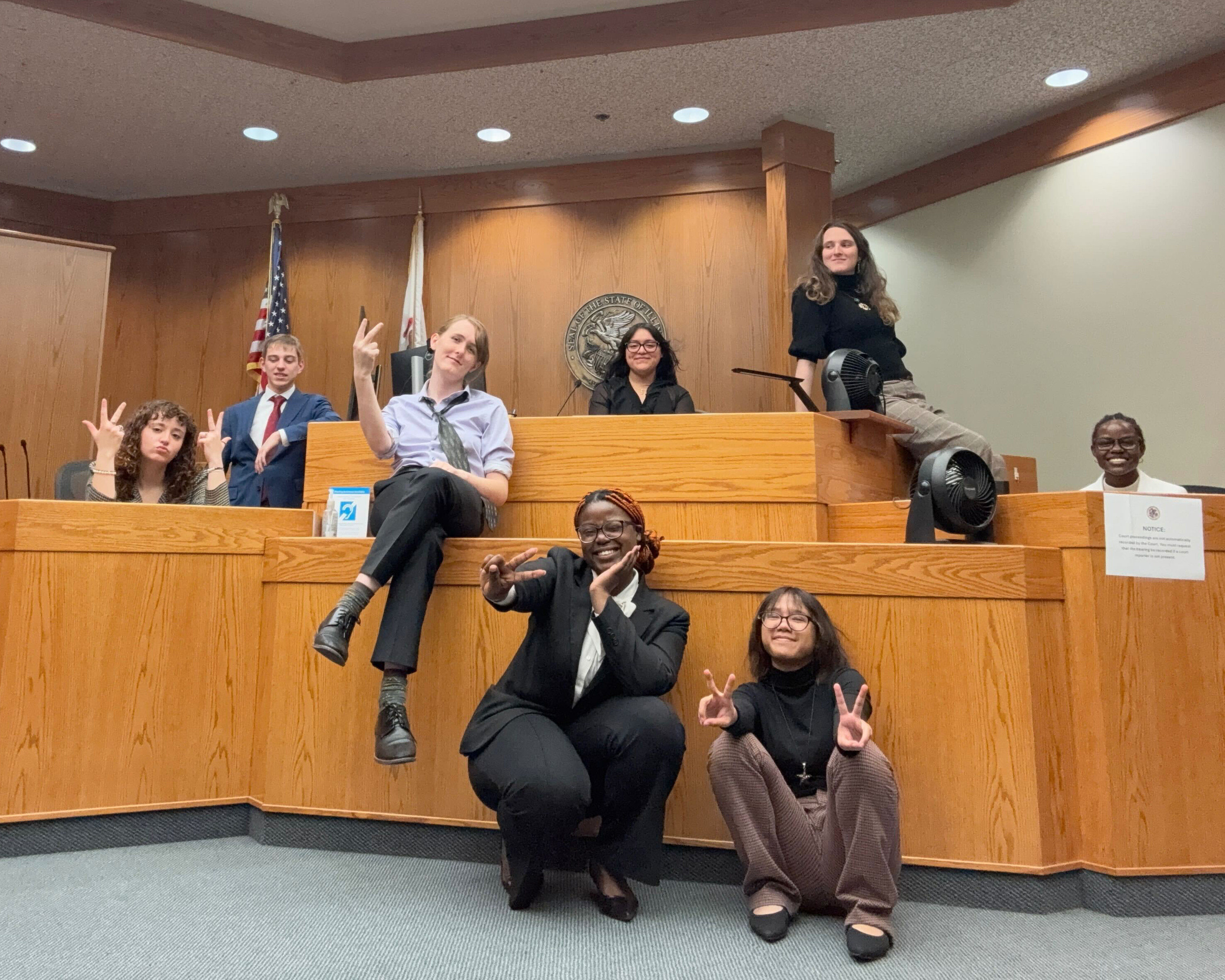 Cornell College mock trial team 1008 takes a moment for a fun photo between rounds.