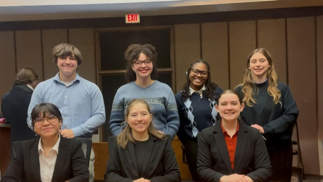 Cornell College mock trial team 1007 takes a moment together between rounds.