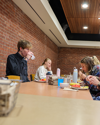 Isaac eating at the Hilltop Cafe.