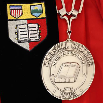 President Brand's Cornell University graduate robes and his Cornell College medalion.