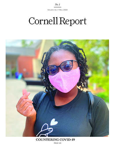 Student on magazine covering wearing mask.