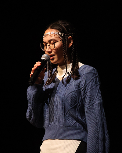 A student shares a piece of their culture at the Culture Show at Cornell College in 2025.